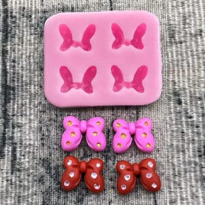 MOLDE SILICONA 4 MINI MOÑOS COQUETTE c/LUNARES